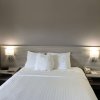 Отель Microtel Inn & Suites by Wyndham Charlotte Airport, фото 9