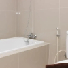 Отель Comfortable And Spacious Studio At Azalea Suites Apartment, фото 7