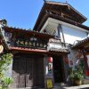 Отель Lijiang Ancient Town International Youth Hostel, фото 1