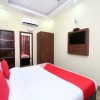 Отель OYO 4548 Hotel Tom Stay, фото 7