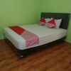 Отель OYO 93021 Kost Dison, фото 7
