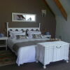 Отель T'Niqua Stable Inn, фото 2