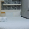 Отель Minimalist 1BR with Pool View at Bassura City Apartment, фото 13