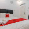 Отель RedDoorz Plus @ Puncak Mas Cottage, фото 4