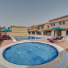 Отель J5 Villas Holiday Homes - Barsha Gardens, фото 24