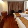 Отель Qingdao Dusco Holiday Apartment, фото 3