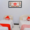 Отель OYO 421 Alianda Guest House Syariah, фото 5