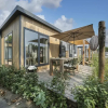 Отель Modern Chalet With air Conditioning, on a Holiday Park, 1 km. From the Beach, фото 1