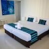 Отель Zenith Ocean Front Apartments, фото 4