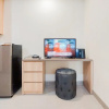 Отель Homey And Modern Studio Apartment B Residence, фото 2