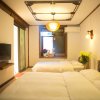 Отель Tian Long Inn - Lijiang, фото 5