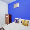 Отель SPOT ON 92921 Omaya Kost Syariah, фото 5