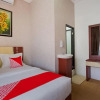 Отель OYO 3225 Alinia Guest House Syariah, фото 8