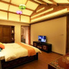 Отель Lijiang Yanlan Cuishe Boutique Inn, фото 4