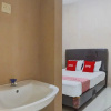 Отель OYO 92826 Penginapan Syariah Faster Inn, фото 14