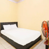 Отель SPOT ON 92323 Ririn Homestay, фото 6