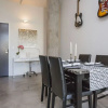 Отель Industrial Chic Condo with Balcony, фото 11
