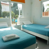 Отель Beach Front Bella Vista - Superb Villa 10 Min Walk To Fig Tree Bay, фото 5