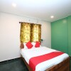Отель OYO 18348 V Wella Comforts, фото 14