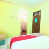 Отель OYO 92503 Penginapan & Villa Sirait, фото 16