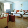 Отель Goldmet Inn Xishuangbanna New Bridge, фото 2