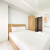 Отель Cozy And Spacious Studio Room At Mekarwangi Square Apartment, фото 5