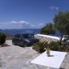 Отель 4 bedrooms villa with sea view private pool and enclosed garden at Mykonos 2 km away from the beach, фото 1