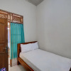 Отель OYO Life 92838 Kost Ibu Surya, фото 13