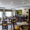 Отель Sleep Inn Airport - Billy Graham Parkway, фото 16