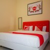 Отель Delima Guest House Syariah by OYO Rooms, фото 6