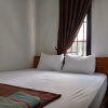 Отель Super OYO 93085 Homy Stay Syariah, фото 6