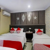 Отель OYO 90564 Hotel Merangin Syariah, фото 31