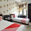Отель D' Best Homestay by OYO Rooms, фото 2
