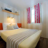Отель Mobilhome Climatisé 3ch 6p Dans Parc Des 7 Fonts, фото 2