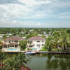 Отель Gorgeous 5 Bedroom Home w/heated Pool Canal Front, фото 1