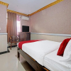 Отель O Fitriaendika Residence Near Pasar Raya Padang, фото 7