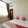 Отель OYO 1997 Bee M Near RS Muhammadiyah, фото 7