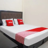 Отель OYO 90785 Mutiara Guest House, фото 7