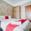 Отель RedLiving Apartemen Green Lake View Ciputat - Pelangi Rooms Tower E, фото 6