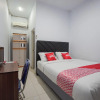 Отель OYO 2566 Putri Kesia Rooms, фото 4