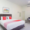 Отель OYO 1569 Kupula Guest House, фото 4