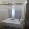 Отель Cozy 1-bed Apartment in MSA Shanzu With Pool, фото 14