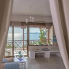Отель Paralio Astros Beachfront Suites, фото 1