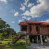 Отель The Happy 8 Retreat X Kampung House в Ипохе