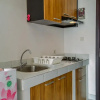 Отель Compact and Modern Studio Room at Casa De Parco Apartment, фото 8