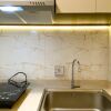 Отель Spacious And Homey 2Br At Meikarta Apartment, фото 10
