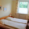 Отель Ferienwohnung 4, EG, Hof zur Sonnenseite Fehmarn, фото 3