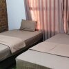 Отель OYO 92767 Losmen Griya Mulia Katingan Kuala, фото 18