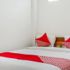 Отель OYO 447 Hutasimo Residence, фото 13