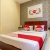 Отель Capital O 615 Residence Puri Hotel Syariah, фото 6